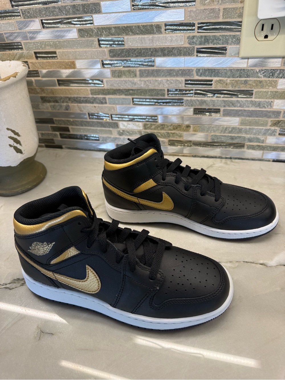 Nike Boy’s Black and Gold Mid-Top Sneakers